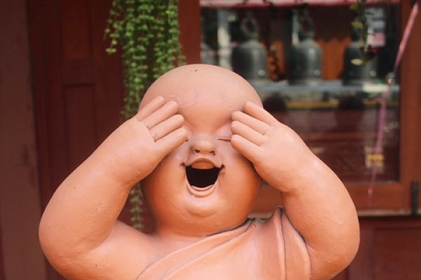 Laughing meditation statue