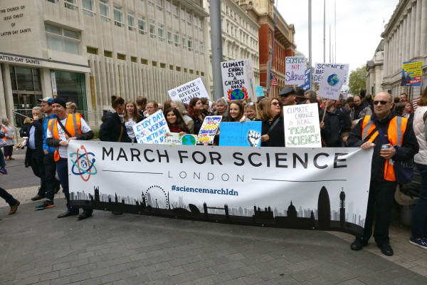 people supporting the March for Science march