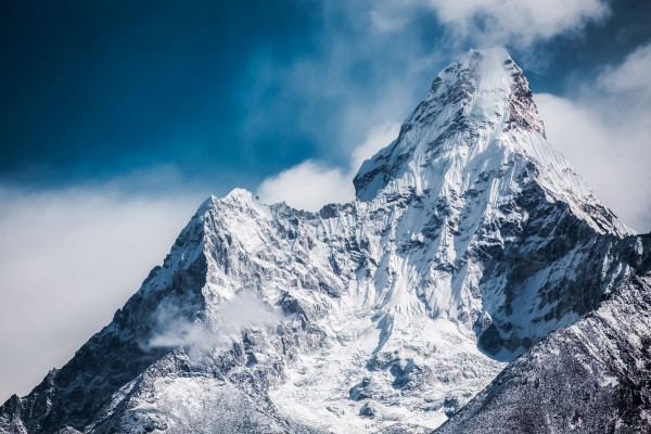 Pointed mountain covered in snow