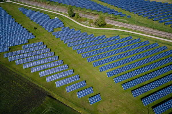 Solar panels in a field from an aerial view