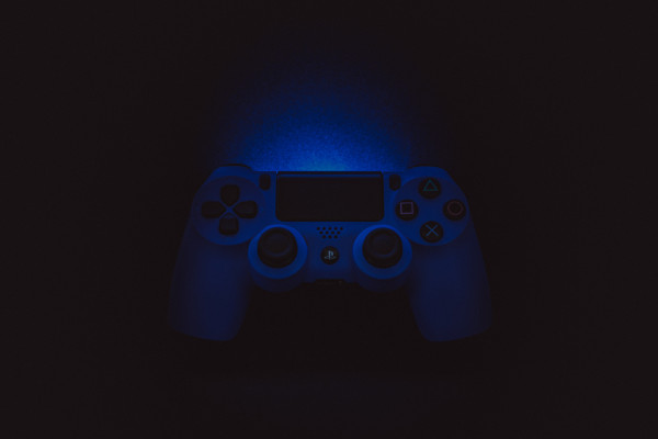 A playstation controller in the dark
