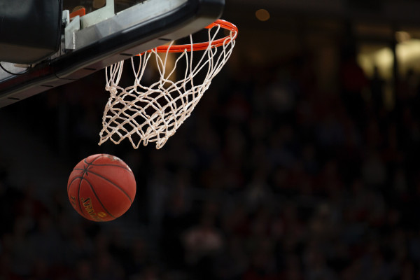 Basketball going through a hoop