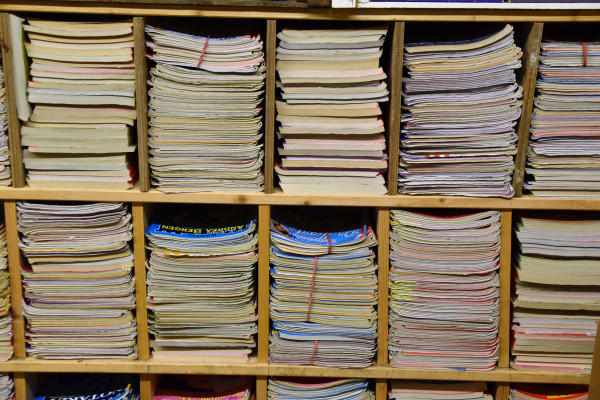 Journals on a bookshelf