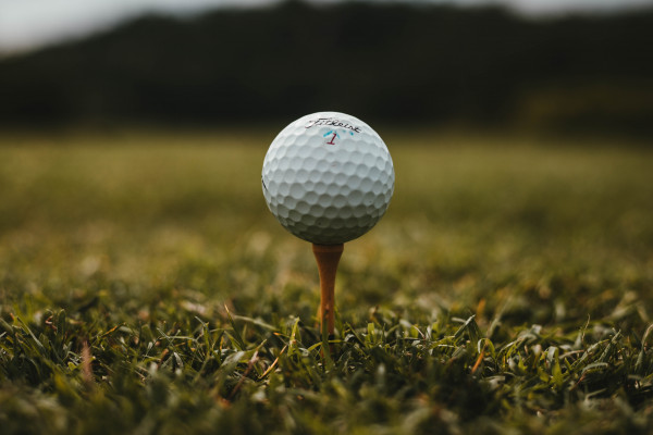 A golf ball on a tee