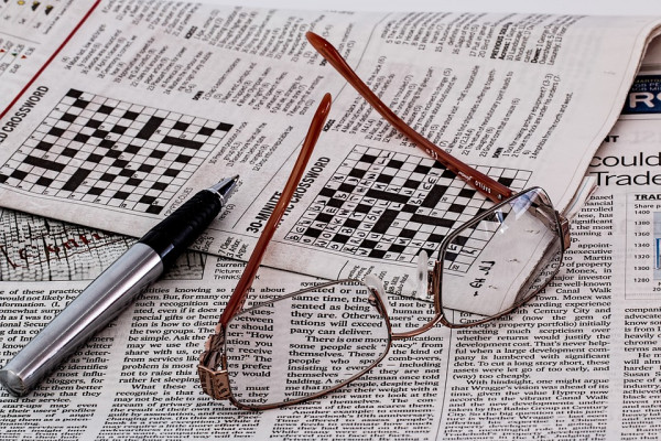 A newspaper with a crossword