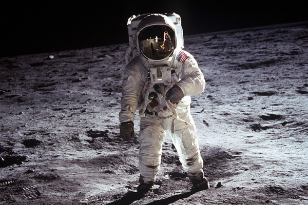 An astronaut standing on the Moon's surface