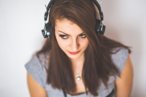 A woman wearing headphones