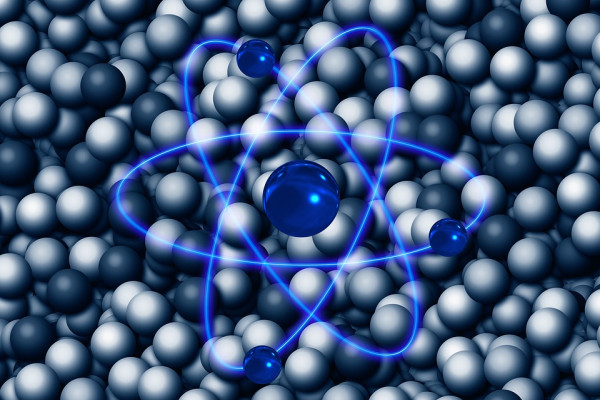 A blue line graphic of an atom, against a background of grey spheres