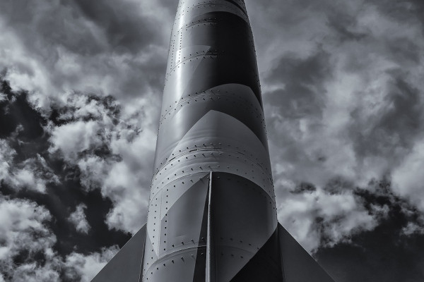 a greyscale image of a large rocket