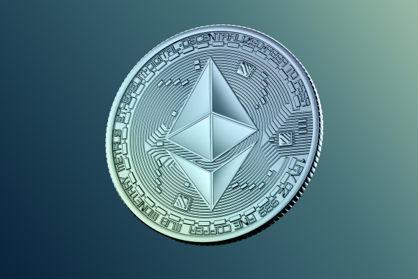 A coin with the Ethereum logo.