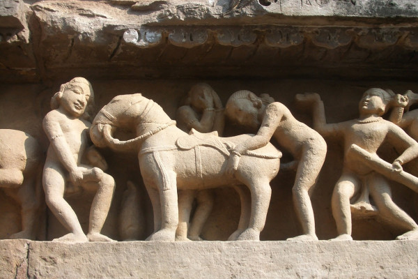 Ancient stone relief depicting sex acts