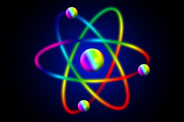 An atom graphic coloured with a rainbow gradient
