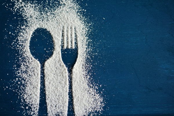 Spoon and fork outline in salt