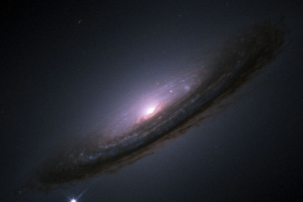 A supernova in the bottom left of the galaxy