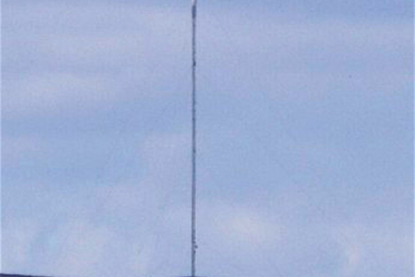 Photograph of the Angus Transmitting Station, also known as the Angus Tall Tower, taken from Fife.