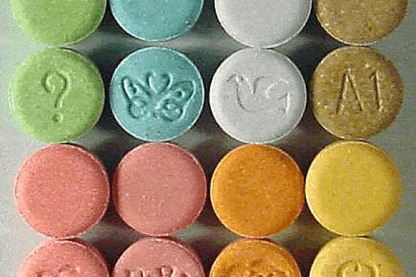 Monogrammed pills of the drug ecstasy.