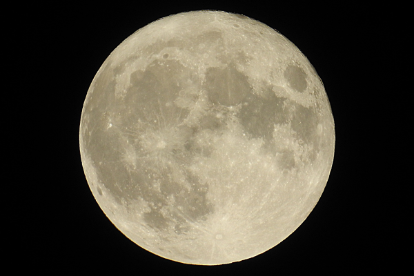Photograph of a full moon, viewed from the Earth