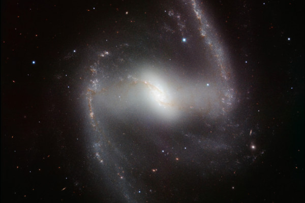  This striking new image, taken with the powerful HAWK-I infrared camera on ESOs Very Large Telescope at Paranal Observatory in Chile, shows NGC 1365. This beautiful barred spiral galaxy is part of the Fornax cluster of galaxies, and lies about 60...