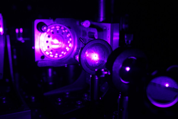Making photons identical. A multi-photon down-conversion source in Bristol.