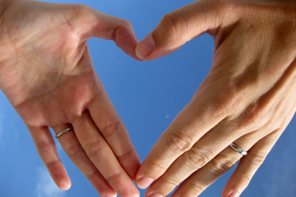 Two hands forming a heart shape.
