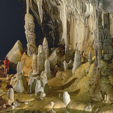 Stalagmites, stalactites, and draperies by a pool in Lechuguilla Cave, New Mexico, USA.