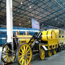 A real representation of Stephenson's Rocket in its original form.