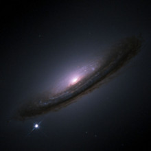A supernova in the bottom left of the galaxy
