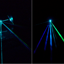An argon laser beam consisting of multiple colors (wavelengths) strikes a silicon diffraction mirror grating and is separated into several beams, one for each wavelength. The wavelengths are (left to right) 458nm, 476nm, 488nm, 497nm, 502nm, 515nm.