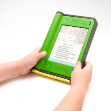 A user viewing an electronic page on an eBook-reading device - a $100 Laptop prototype