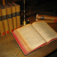 A multi-volume Latin dictionary (Egidio Forcellini: Totius Latinitatis Lexicon, 1858-87) in a table in the main reading room of the University Library of Graz. Definitely an old book!