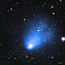 Galaxy cluster ACT-CL J0102-4915 This picture of the galaxy cluster ACT-CL J0102-4915 combines images taken with ESOs Very Large Telescope with images from the SOAR Telescope and X-ray observations from NASAs Chandra X-ray Observatory. The X-ray image shows the hot gas in the...