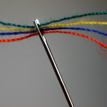 A threaded needle.