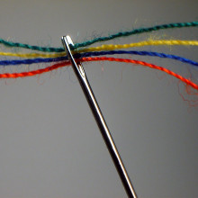 A threaded needle. A threaded needle.