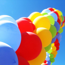 An arch of colourful party balloons