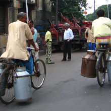 Milk churns being carried on bicycles, Kolkata, India.