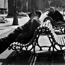 A couple of guys sleeping near the Kiosko Alfonso in A Coruña (Galicia, España.)