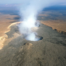Erta Ale is an active shield volcano located in the Afar Region of northeastern Ethiopia. It is the most active volcano in Ethiopia. Erta Ale stands 613 metres tall, with a lava lake, one of only four in the world, at the summit.