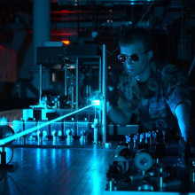 A military scientist operates a laser in a test environment. The Directorate conducts research on a variety of solid-state and chemical lasers.