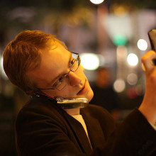Someone with a phone and a camera Someone with a phone and a camera