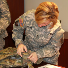 Army Surgeon General dons new female body armor.