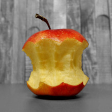 An apple, part-eaten