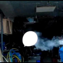 Balloon trailing smoke