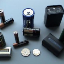 Various batteries: two 9-volt, two \AAA\, two \AA\, and one each of \C\, \D\, a cordless phone battery, a camcorder battery, a 2-meter handheld ham radio battery, and a button battery.