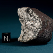  112.2 g fragment of the Chelyabinsk (Cherbakul) meteorite. This specimen was found on a field between the villages of Deputatsky and Emanzhelinsk on February 18, 2013. The broken fragment displays thick primary fusion crust with flow lines and a...