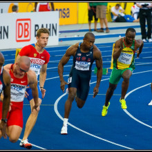 Athletes turning the first bend of the 200 m