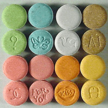 Monogrammed pills of the drug ecstasy.