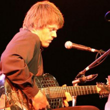 James Michael Thompson playing his one-of-a-kind 8 string baritone tricone resonator guitar. James Michael Thompson playing his one-of-a-kind 8 string baritone tricone resonator guitar.