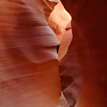 Inside Lower Antelope Canyon, featuring red sandstone corridors.