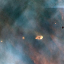  A Hubble Space Telescope view of a small portion of the Orion Nebula reveals five young stars. Four of the stars are surrounded by gas and dust trapped as the stars formed, but were left in orbit about the star. These are possibly protoplanetary...