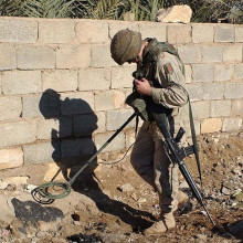 A U.S. Army soldier using a Schiebel AN 19/2 MOD7 metal detector